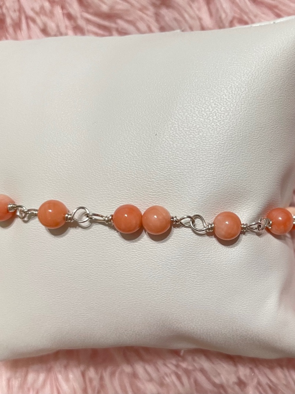 Hand made Angel Skin Coral 5mm bracelet Size:6 1/2 inch/ extin 7 1/2 inch. New!